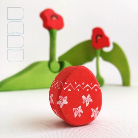 DaduGarden Easter mound with two small and one large pits, and one egg 