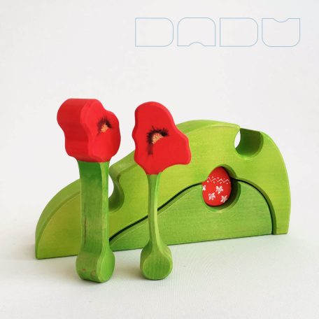 DaduGarden Easter mound with two small and one large pits, and one egg 