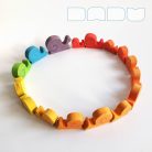 Snails in every color of the rainbow - wooden figures