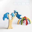 Elephant family below the rainbow