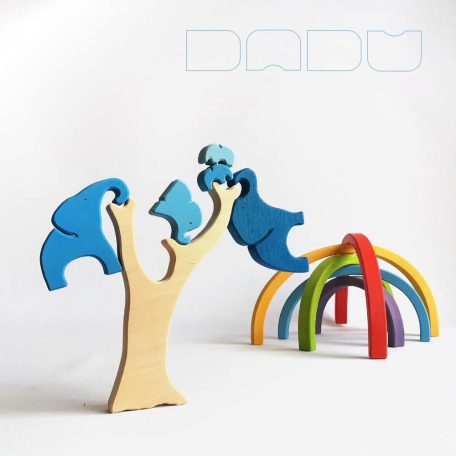 Elephant family below the rainbow