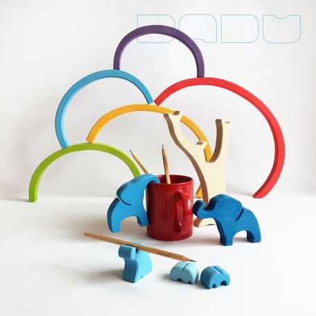 Elephant family below the rainbow