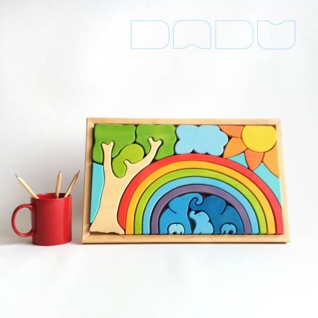 Elephant family below the rainbow