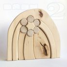 Raw wooden puzzles, nativity scene and stargate