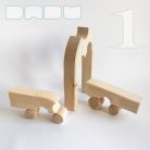 Raw wooden puzzles, nativity scene and stargate