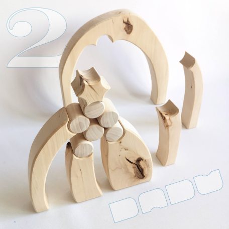 Raw wooden puzzles, nativity scene and stargate