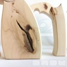 Raw wooden puzzles, nativity scene and stargate