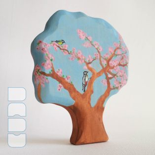 Birds on blooming tree—wooden toy