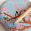 Birds on blooming tree—wooden toy