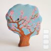 Birds on blooming tree—wooden toy