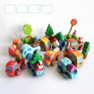 Wooden toy pickup trucks—various designs. You can choose several kind of fitting Dadu cargo and passengers to transport with them.