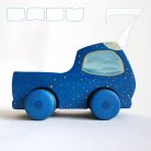 Wooden toy pickup trucks—various designs. You can choose several kind of fitting Dadu cargo and passengers to transport with them.