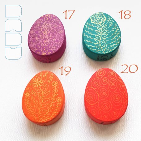 Fabergé eggs according to Dadu—unique wooden toys with gold decoration