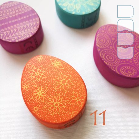 Fabergé eggs according to Dadu—unique wooden toys with gold decoration